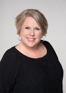 Photo of Julie who treats psychiatric disorders in children.